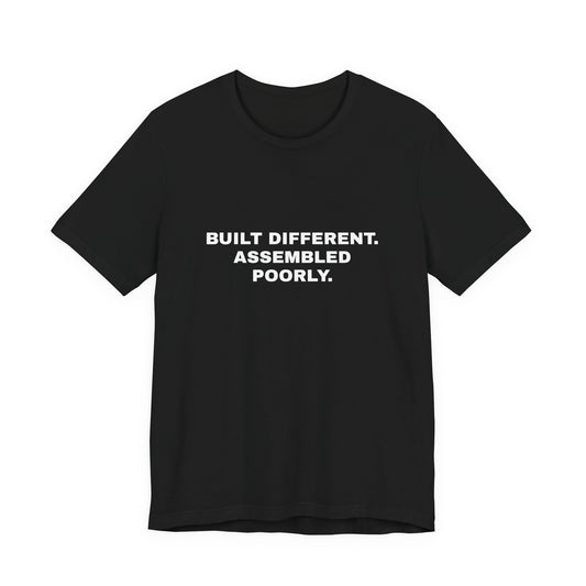 Built Different, Assembled Poorly — Unisex Graphic Tee