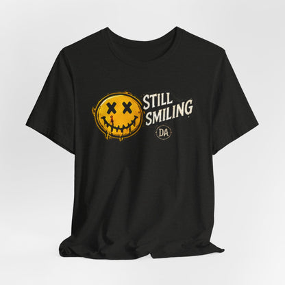 Still Smiling Tee — Grunge Smiley Graphic Tee