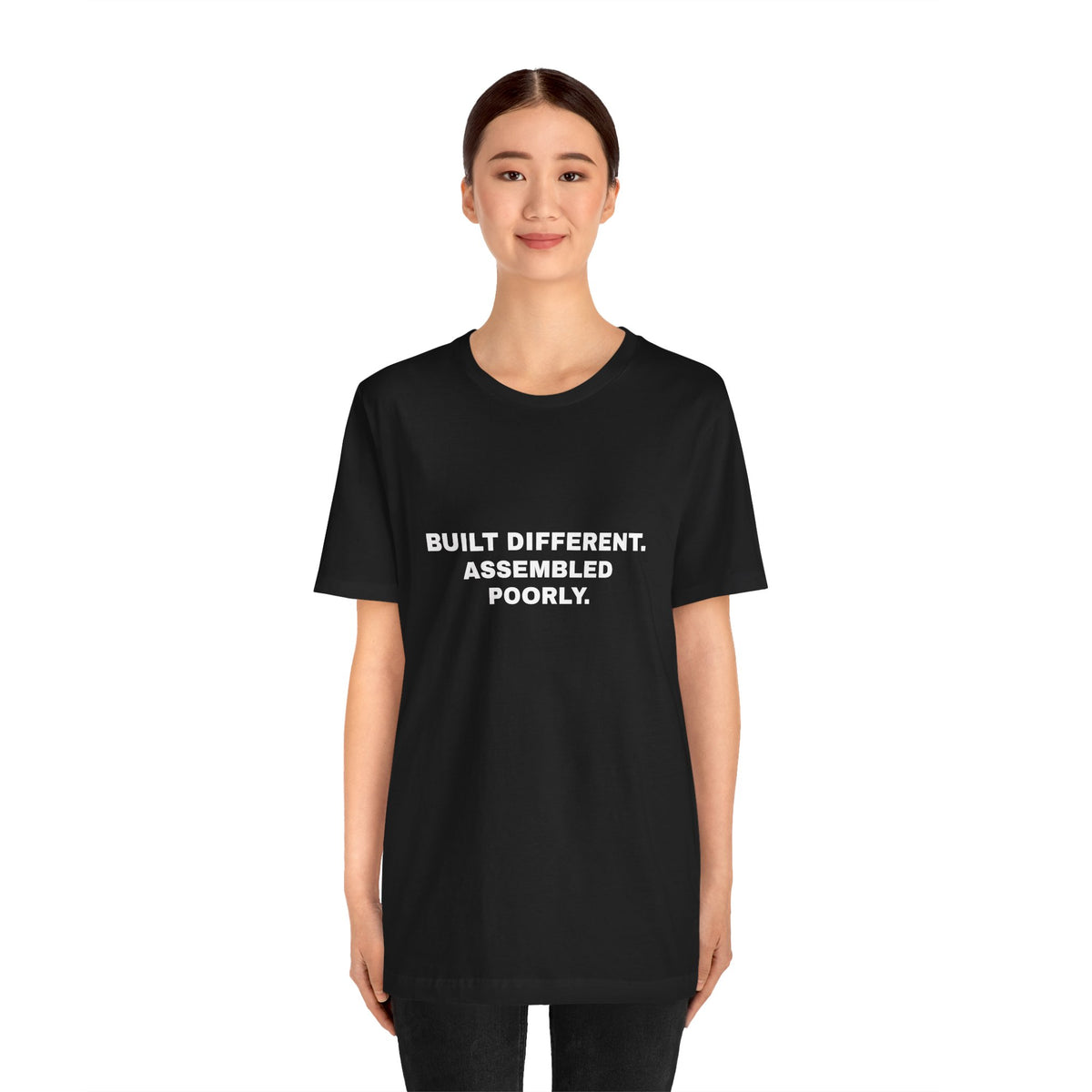 Built Different, Assembled Poorly — Unisex Graphic Tee