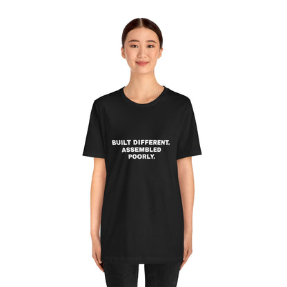Built Different, Assembled Poorly — Unisex Graphic Tee